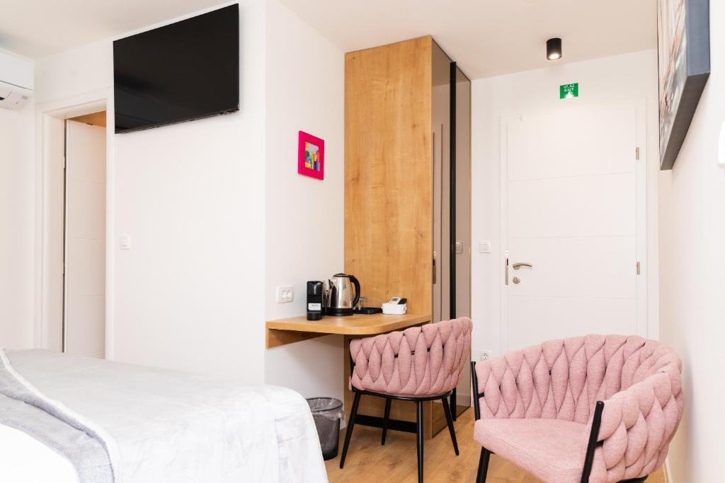 TV a/nebo společenská místnost v ubytování Scaletta Rooms