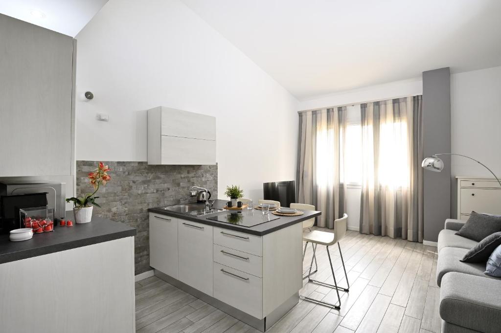 Kuchyňa alebo kuchynka v ubytovaní Boutique Apartment “Diviso Due”