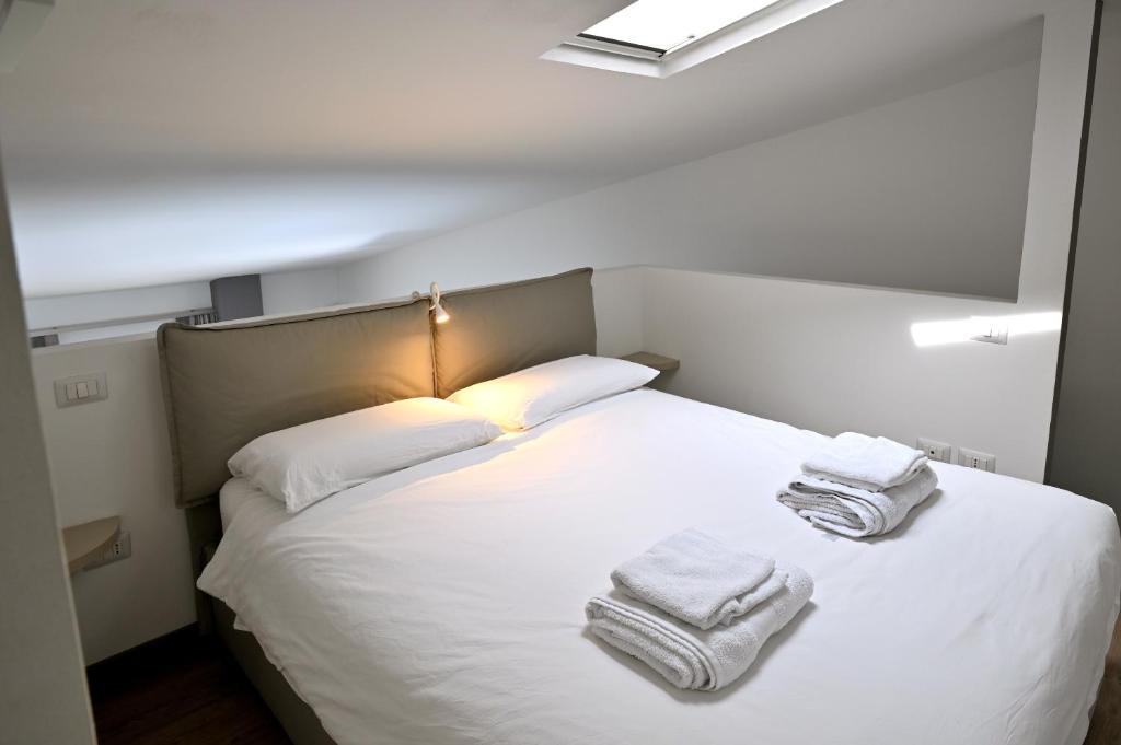 Posteľ alebo postele v izbe v ubytovaní Boutique Apartment “Diviso Due”