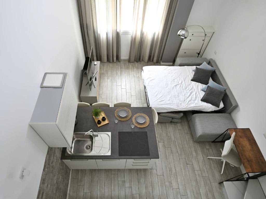 Posteľ alebo postele v izbe v ubytovaní Boutique Apartment “Diviso Due”