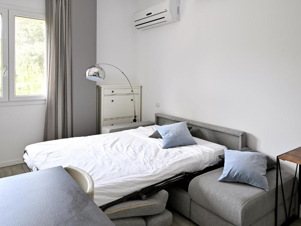 Posteľ alebo postele v izbe v ubytovaní Boutique Apartment “Diviso Due”