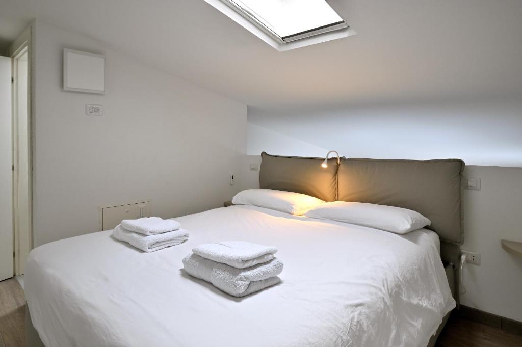 Posteľ alebo postele v izbe v ubytovaní Boutique Apartment “Diviso Due”