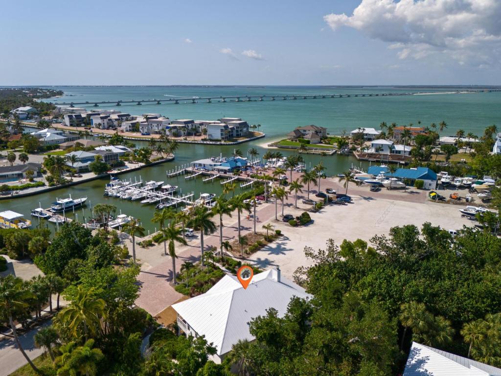an aerial view of a marina with boats in the water at Grandma Dot's House- Marina Villa with Pool and Bikes in Sanibel