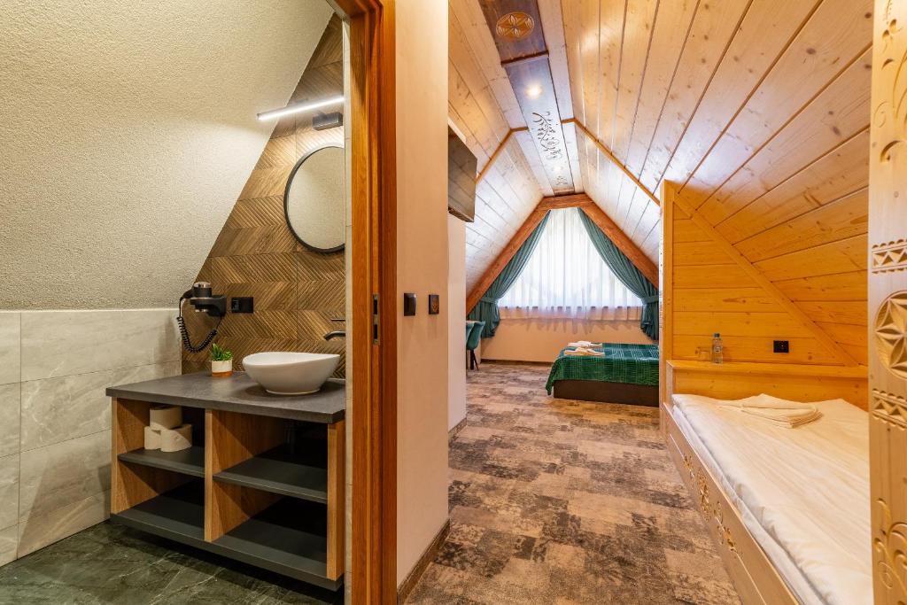 Posteľ alebo postele v izbe v ubytovaní Willa Folk Prestige
