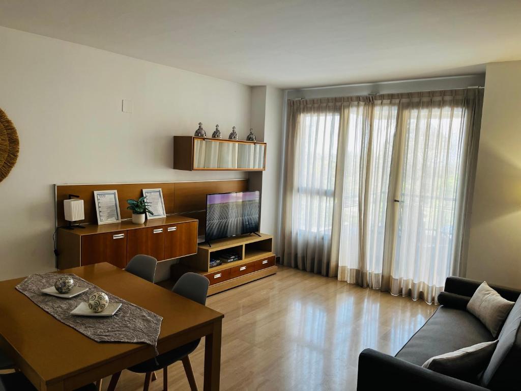TV a/nebo společenská místnost v ubytování Travel Habitat - Ciudad de las Ciéncias