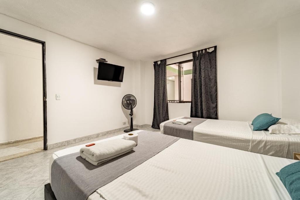 Postel nebo postele na pokoji v ubytování Hotel Balcones del Estadio
