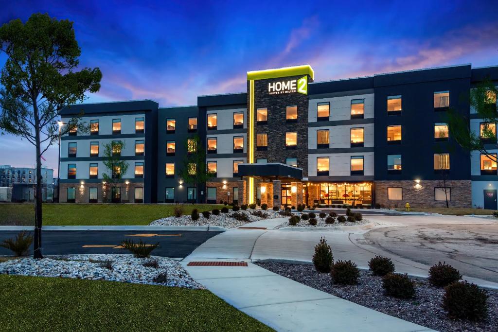 a rendering of a hotel with a building at Home2 Suites By Hilton Bolingbrook Chicago in Bolingbrook