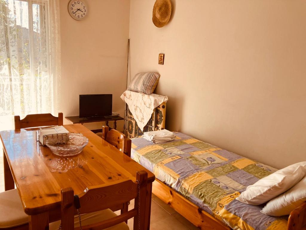 Llit o llits en una habitació de Dimitras Apartment