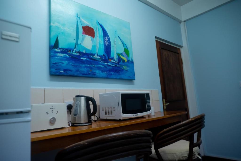 Příslušenství pro přípravu čaje a kávy v ubytování Sutton Place Hotel