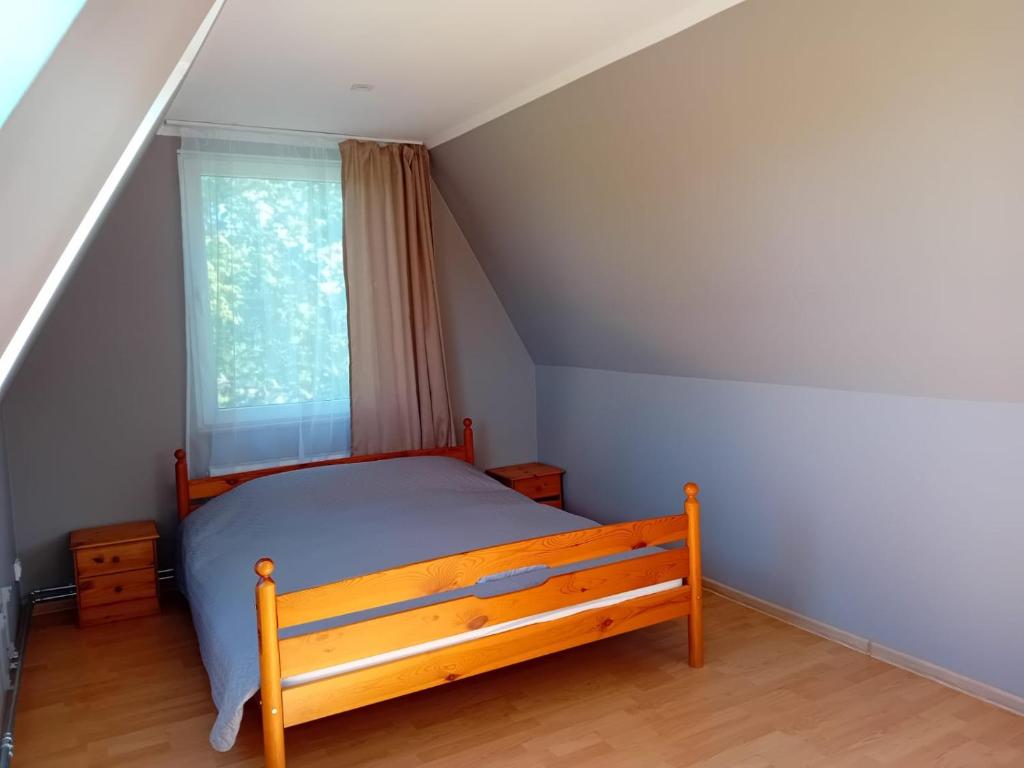 Postel nebo postele na pokoji v ubytování Atpūtas vieta Ežezers