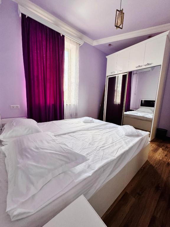 Postel nebo postele na pokoji v ubytování Garden EVN Airport