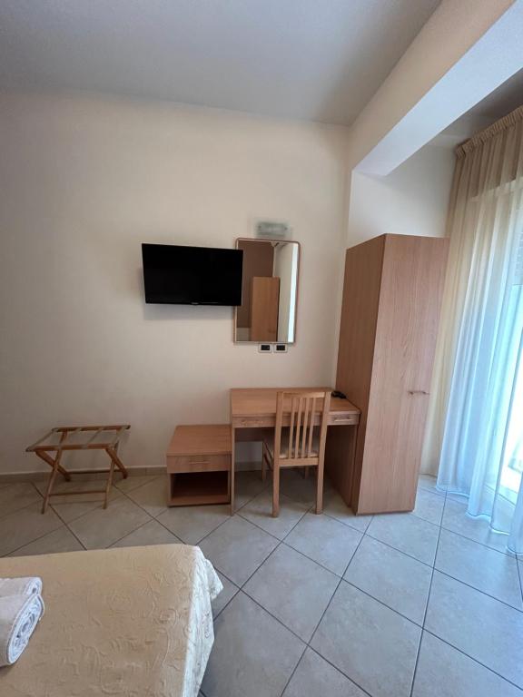 TV a/nebo společenská místnost v ubytování Hotel Favorita