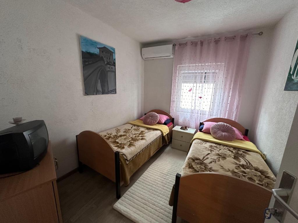 Postel nebo postele na pokoji v ubytování Hostel Backpackers