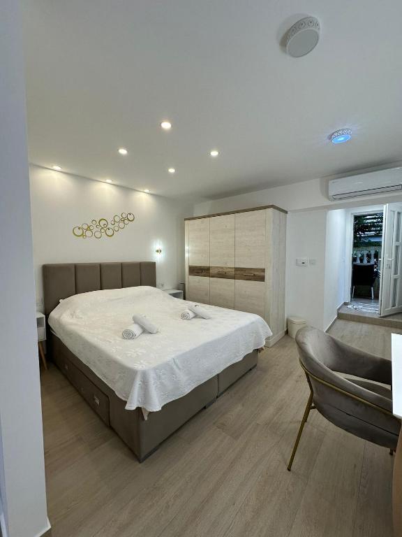 Postel nebo postele na pokoji v ubytování Guest House Sidro