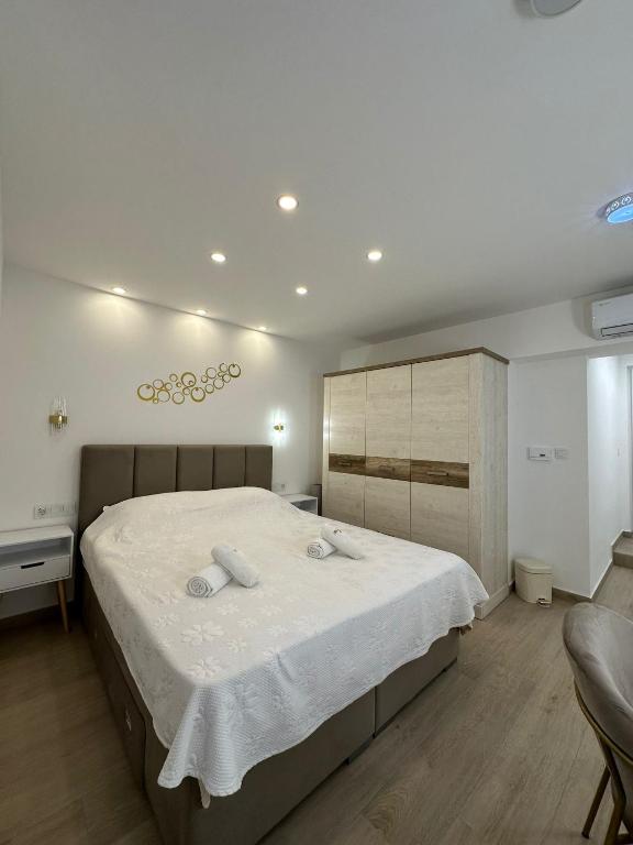 Postel nebo postele na pokoji v ubytování Guest House Sidro