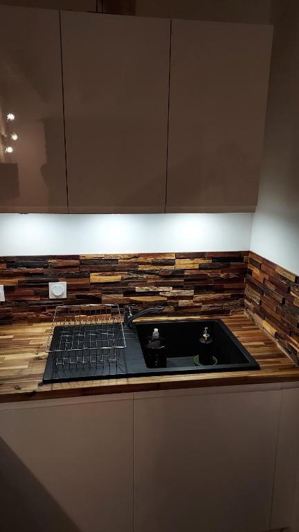 Kuchyň nebo kuchyňský kout v ubytování Duplex Sables d'Or