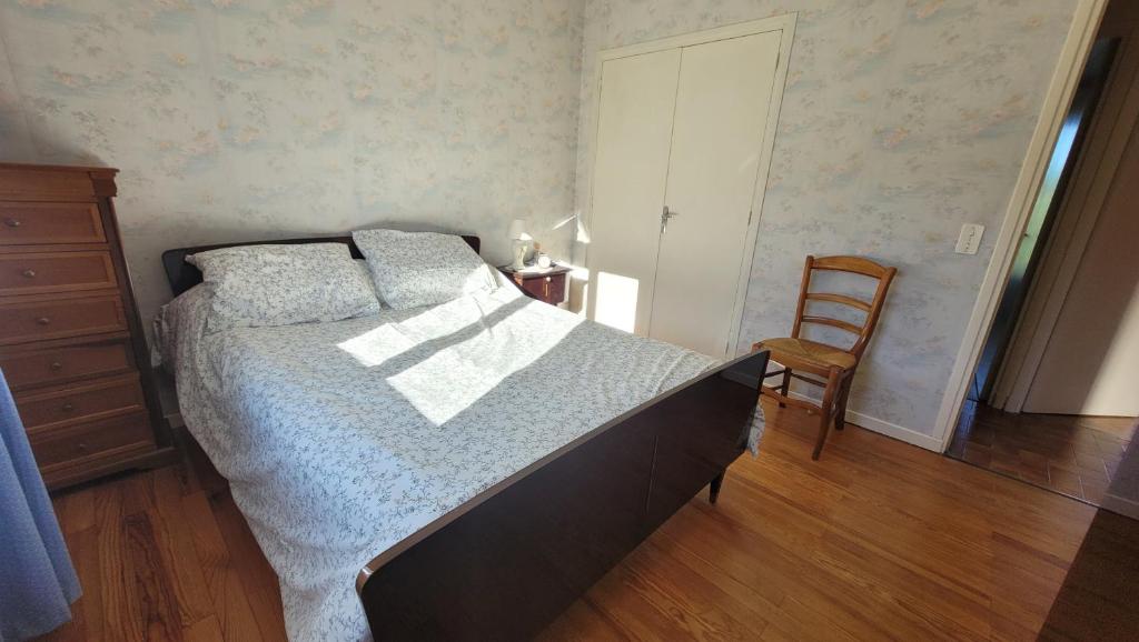 Postel nebo postele na pokoji v ubytování La Maison