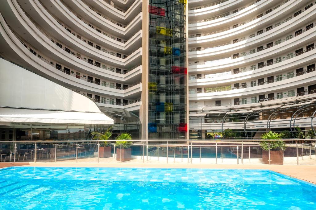 Bazén v ubytování Hotel Spiwak Chipichape Cali nebo v jeho okolí