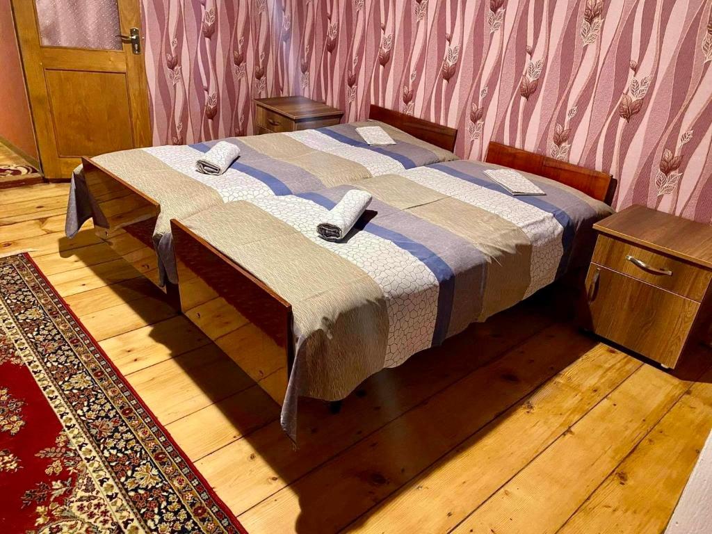 Postel nebo postele na pokoji v ubytování Guesthouse Dadia