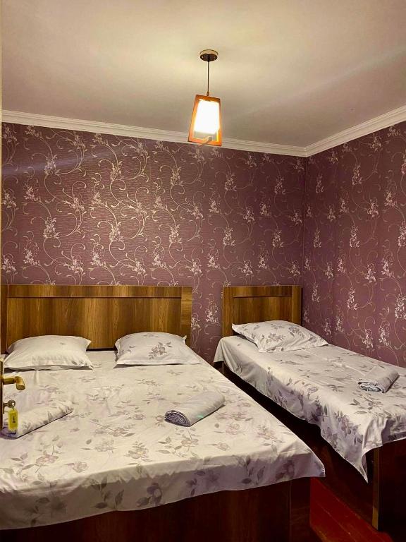 Postel nebo postele na pokoji v ubytování Guesthouse Dadia