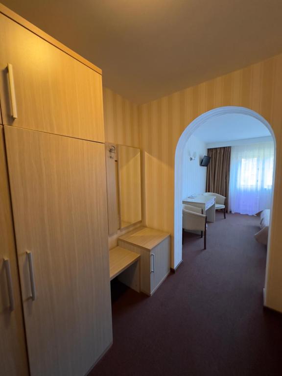 Postel nebo postele na pokoji v ubytování Ideal Predeal