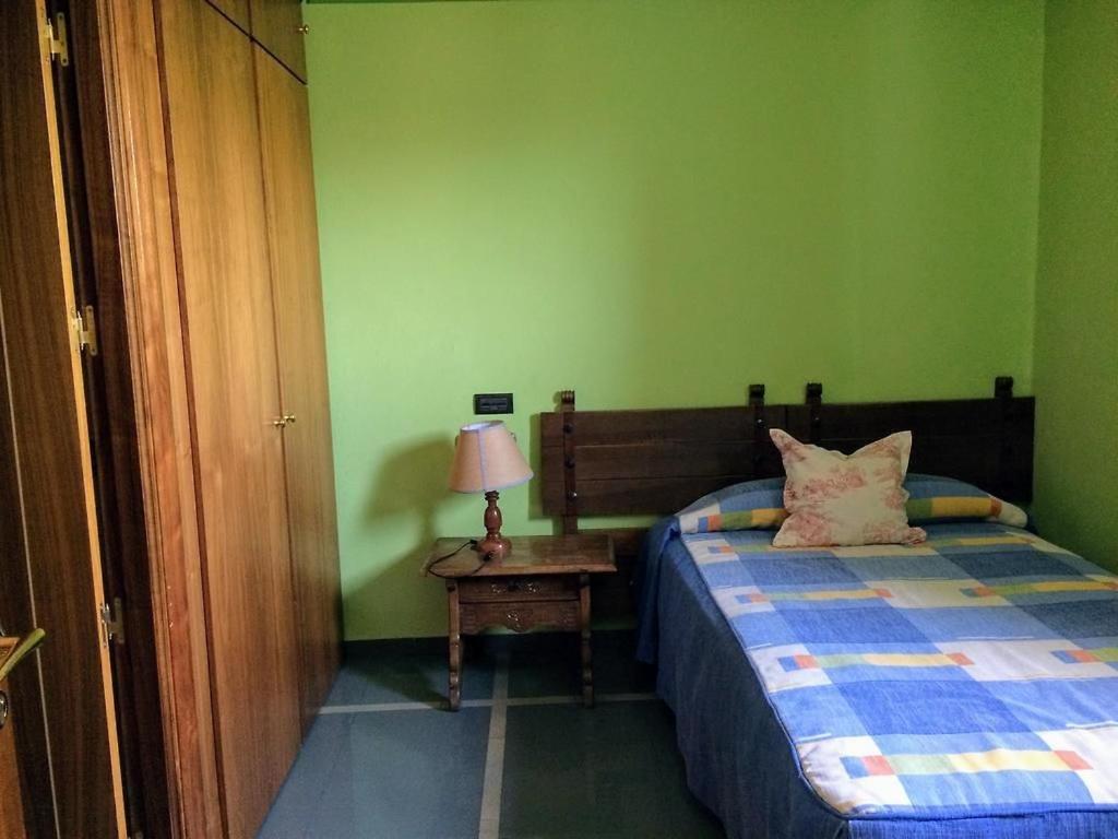 Postel nebo postele na pokoji v ubytování Real Hotel