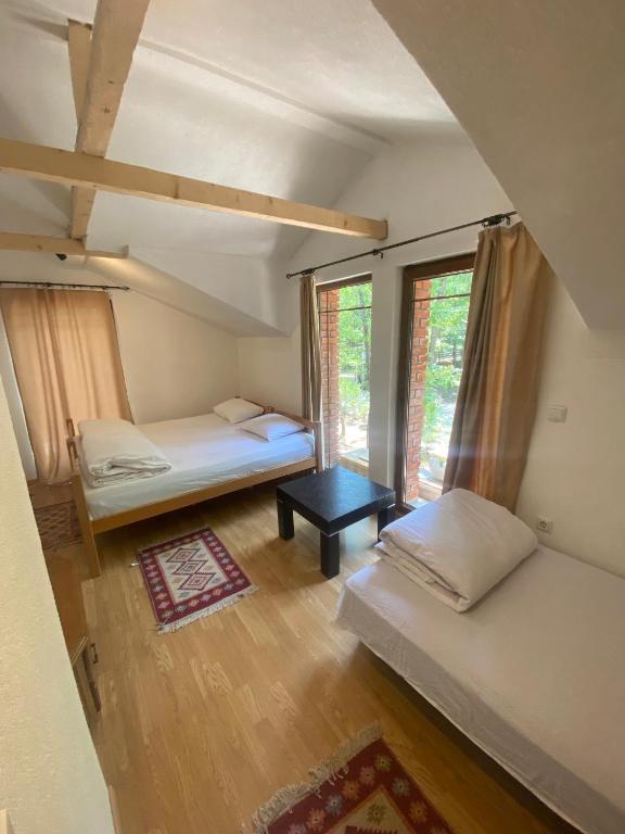 Postel nebo postele na pokoji v ubytování STANET Forest Houses