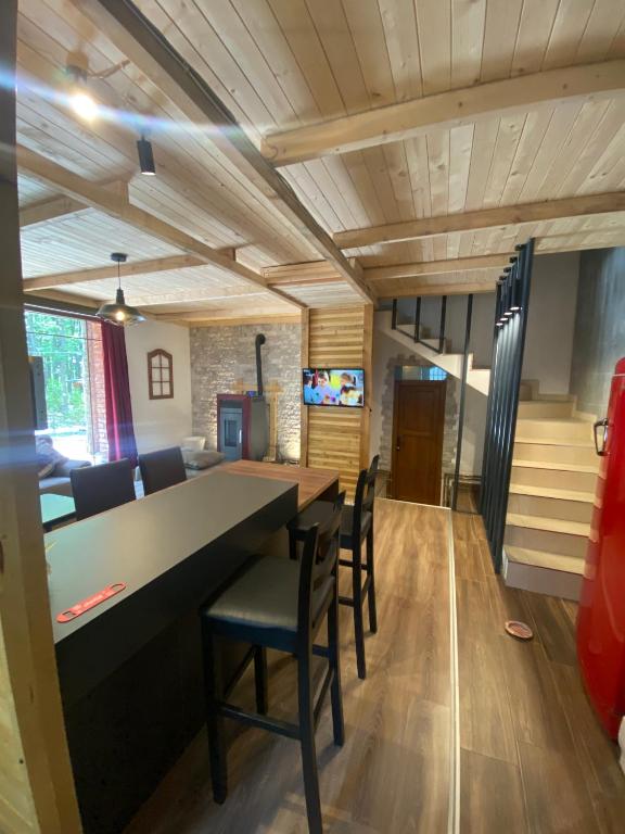 TV a/nebo společenská místnost v ubytování STANET Forest Houses