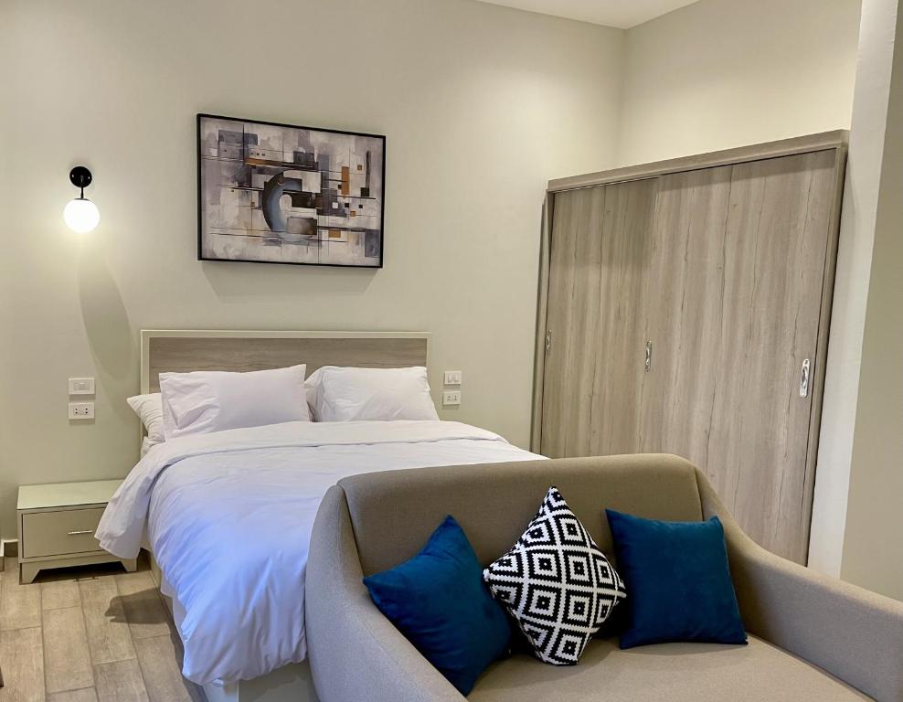 Postel nebo postele na pokoji v ubytování Sleep Inn Apart-Hotel