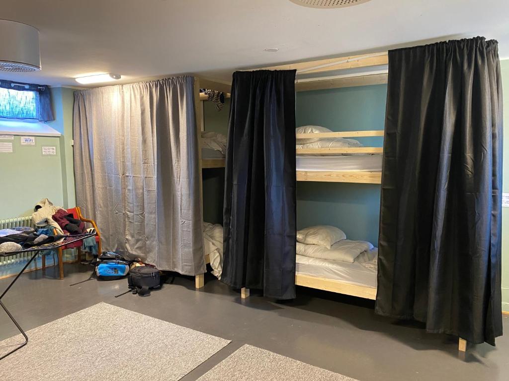 a room with two bunk beds in a room at Sjømannskirken Narvik in Narvik