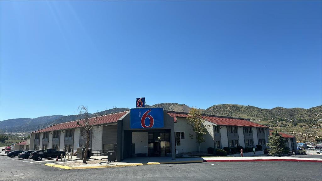 a gas station with a sign in front of it at Motel 6-Lebec, CA in Lebec