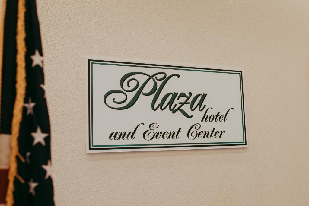 a sign for a hotel and event center on a wall at Carson City Plaza Hotel in Carson City