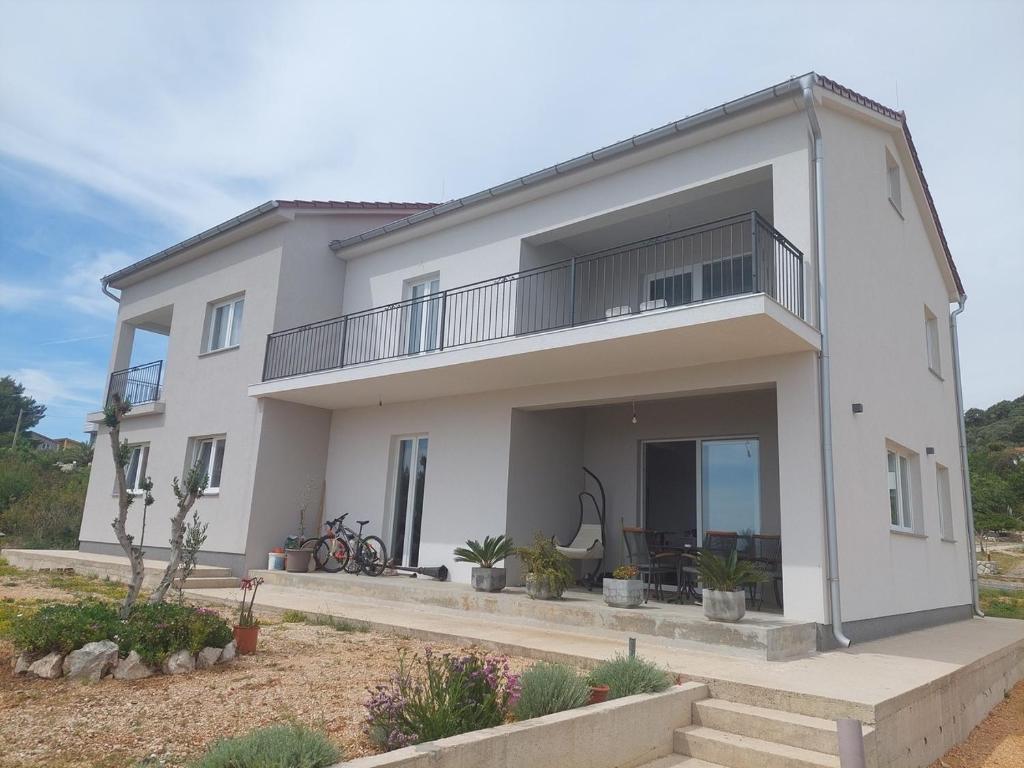 Apartments with parking space Barbat, Rab - 22863
