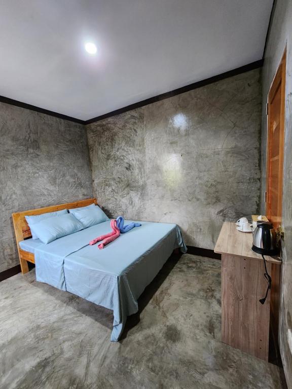 Postel nebo postele na pokoji v ubytování HYD Hostel Moalboal