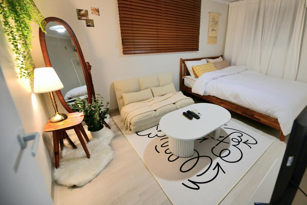 Ένα ή περισσότερα κρεβάτια σε δωμάτιο στο Healing & Romang house