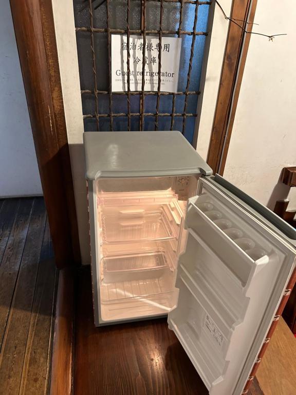 Kuchyň nebo kuchyňský kout v ubytování Kappo Ryokan Uoichi
