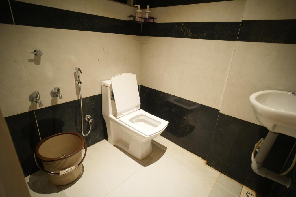 Koupelna v ubytování Rasha residency