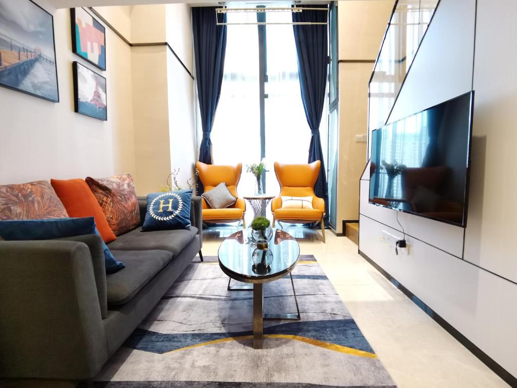 Posezení v ubytování Zun Xiang Executive Apartment - Shenzhen Futian Exhibition Center