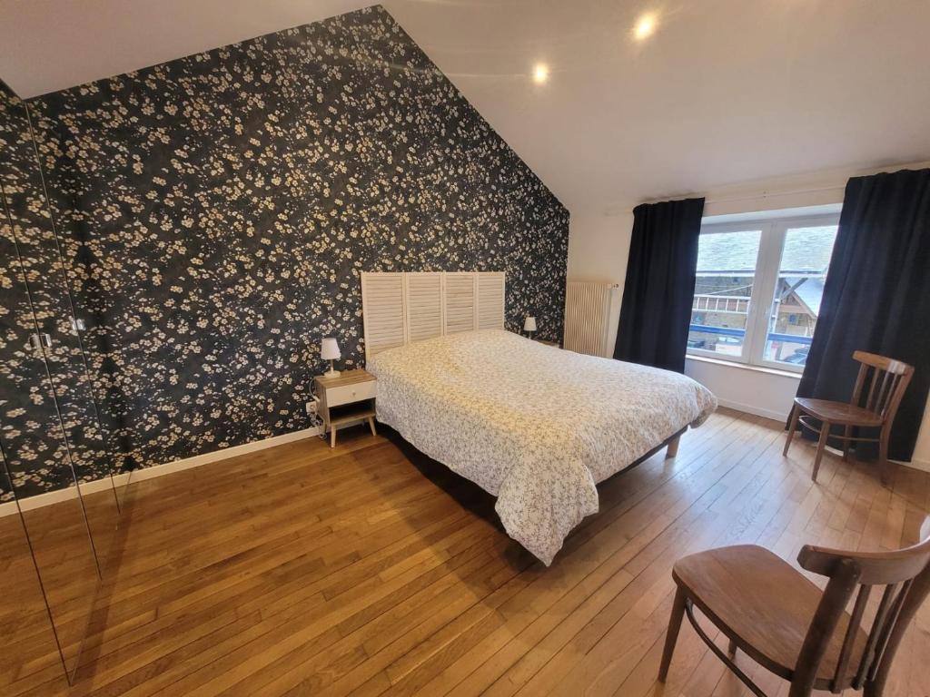 Postel nebo postele na pokoji v ubytování LE RELAIS VAUBAN