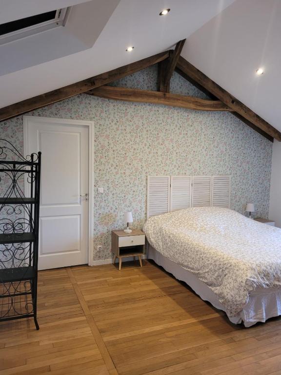 Postel nebo postele na pokoji v ubytování LE RELAIS VAUBAN