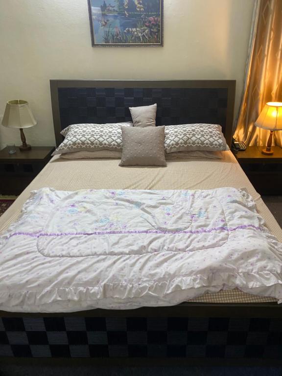 Katil atau katil-katil dalam bilik di Home of golden oriole