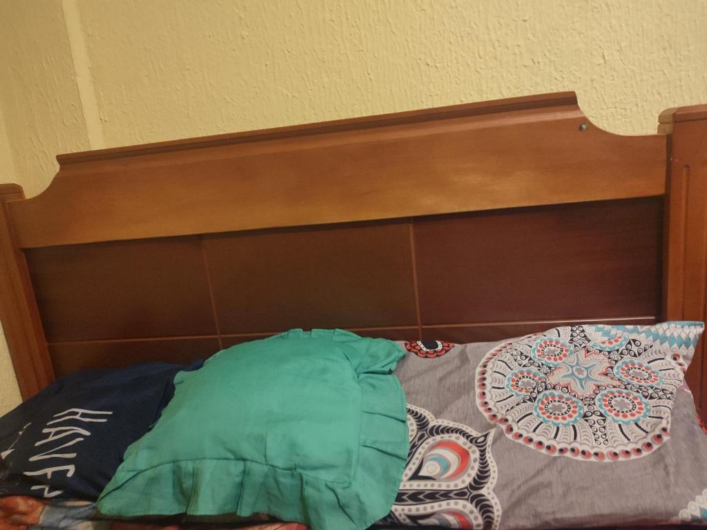 Postel nebo postele na pokoji v ubytování Un Hogar Quiteño