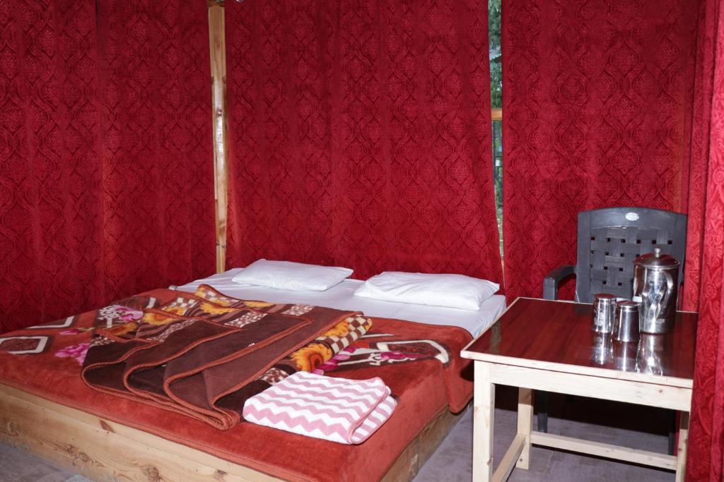 Postel nebo postele na pokoji v ubytování Trekking Cougars Huts