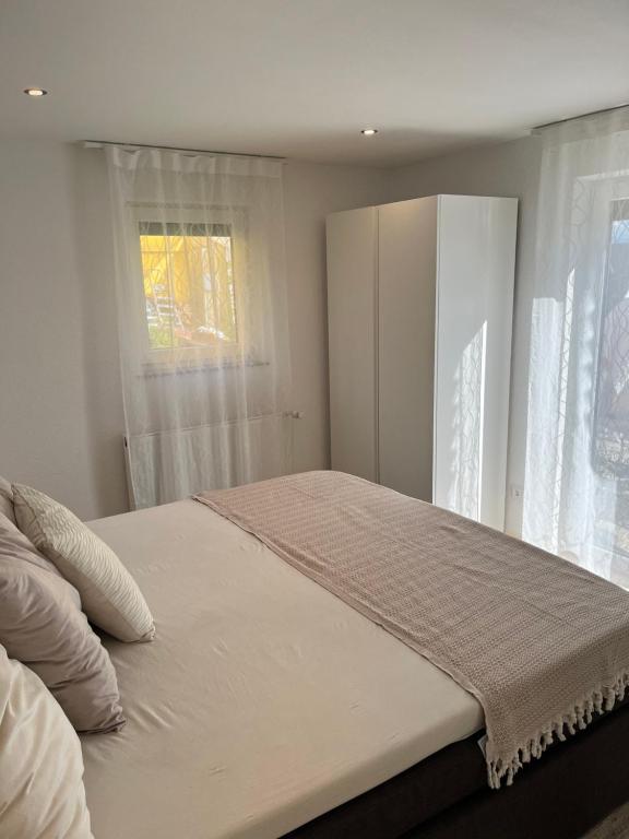 Postel nebo postele na pokoji v ubytování 1-Zimmer Apartment in Altbach