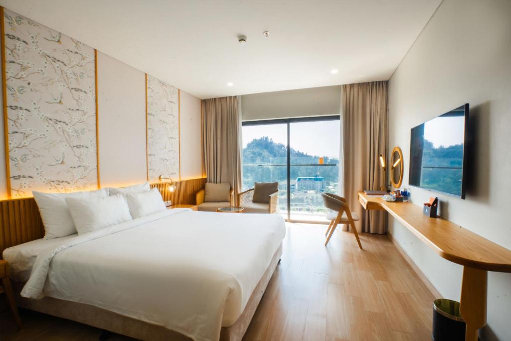 TV a/nebo společenská místnost v ubytování Seabird Hotel Thien Cam