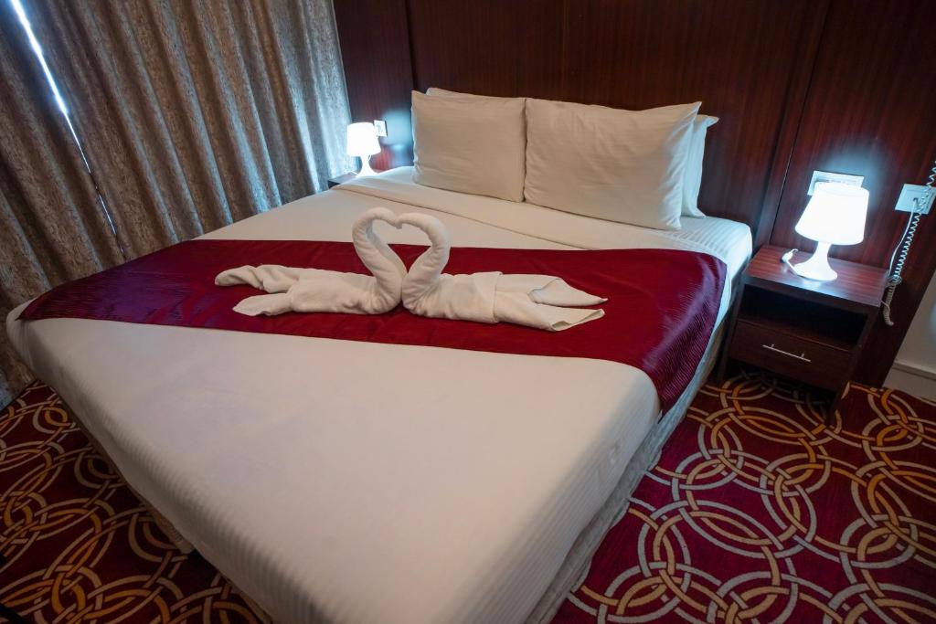 Postel nebo postele na pokoji v ubytování AL KARNAK HOTEL - BRANCH