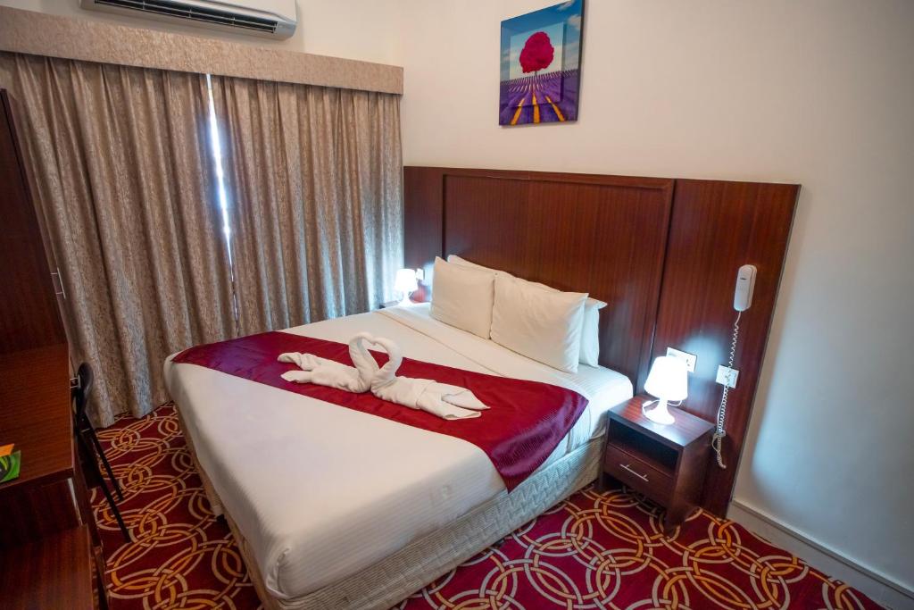 Postel nebo postele na pokoji v ubytování AL KARNAK HOTEL - BRANCH