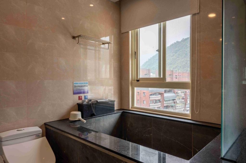 Fotografie z fotogalerie ubytování Muen Yuan Dong Hot Spring Hotel v destinaci Ťiao-si
