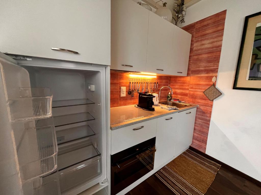 Kuchyň nebo kuchyňský kout v ubytování B&B Romantico Palazzo dei Ulivi