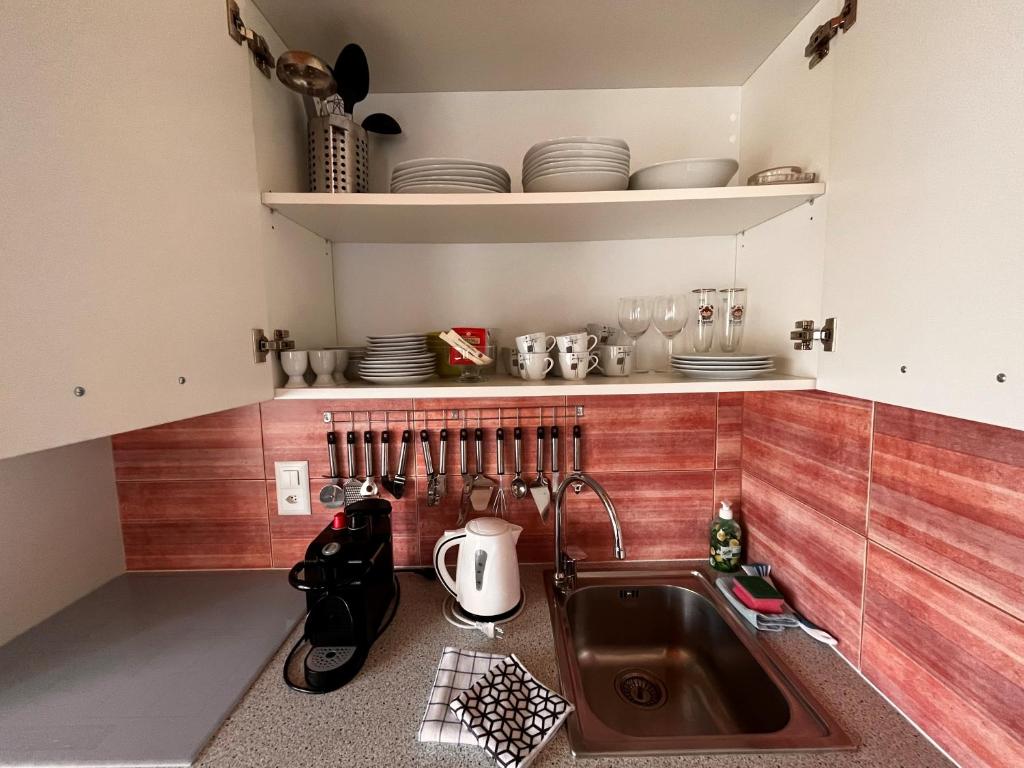 Kuchyň nebo kuchyňský kout v ubytování B&B Romantico Palazzo dei Ulivi